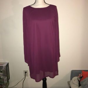 Women’s purple dress with bell flowy sleeves